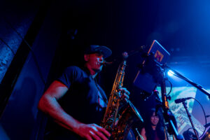 Saxophone player on stage at an after party coordinated by Khoreen Eccleston for GreenBiz Group VERGE 23